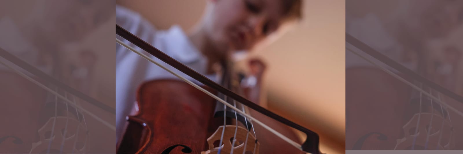 Young cellists practicing together