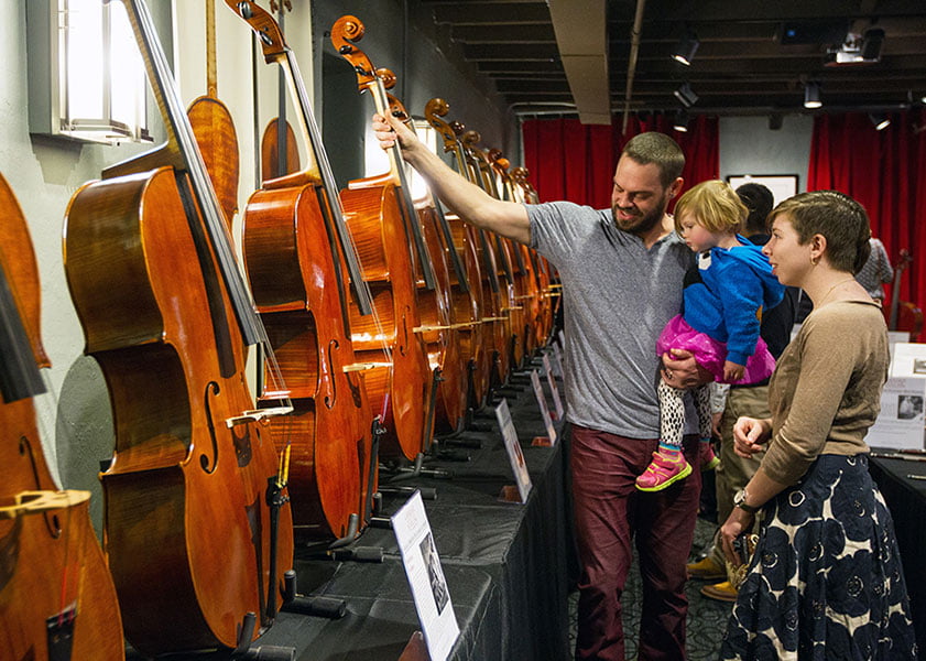 people showing for a cello