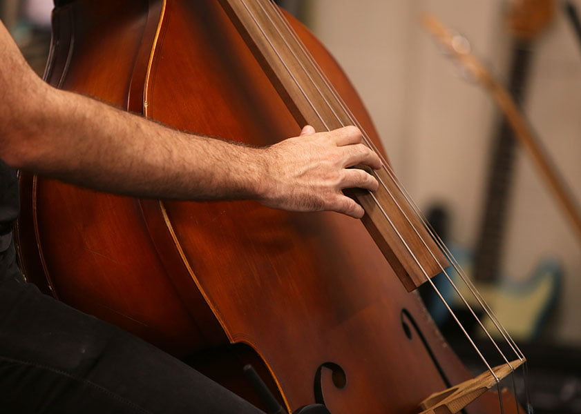 man playing a double bass
