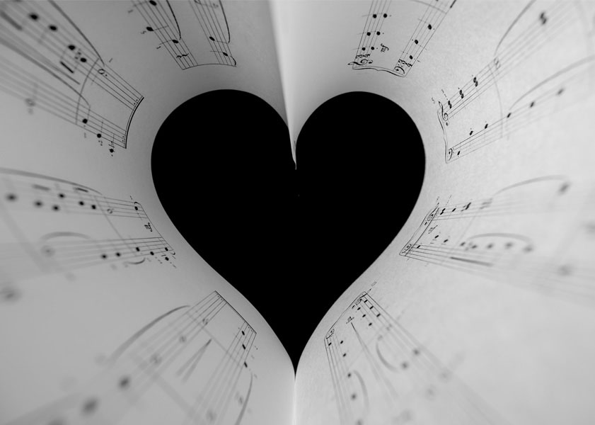 sheet music folded in a heart shape