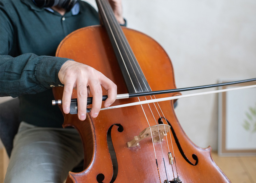 man playing cello